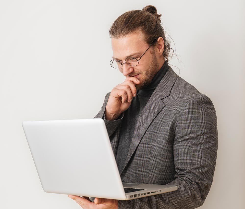 man-holding-laptop man-holding-laptop